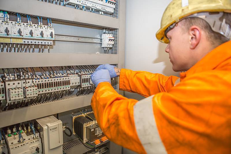 a Forth ports electrical engineer at a fuse box
