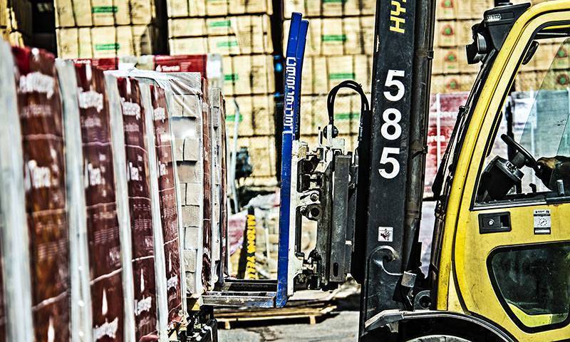 Fork lift truck picking forest products