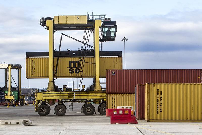a Straddle carrier putting container into stack at Grangemouth Container Terminal